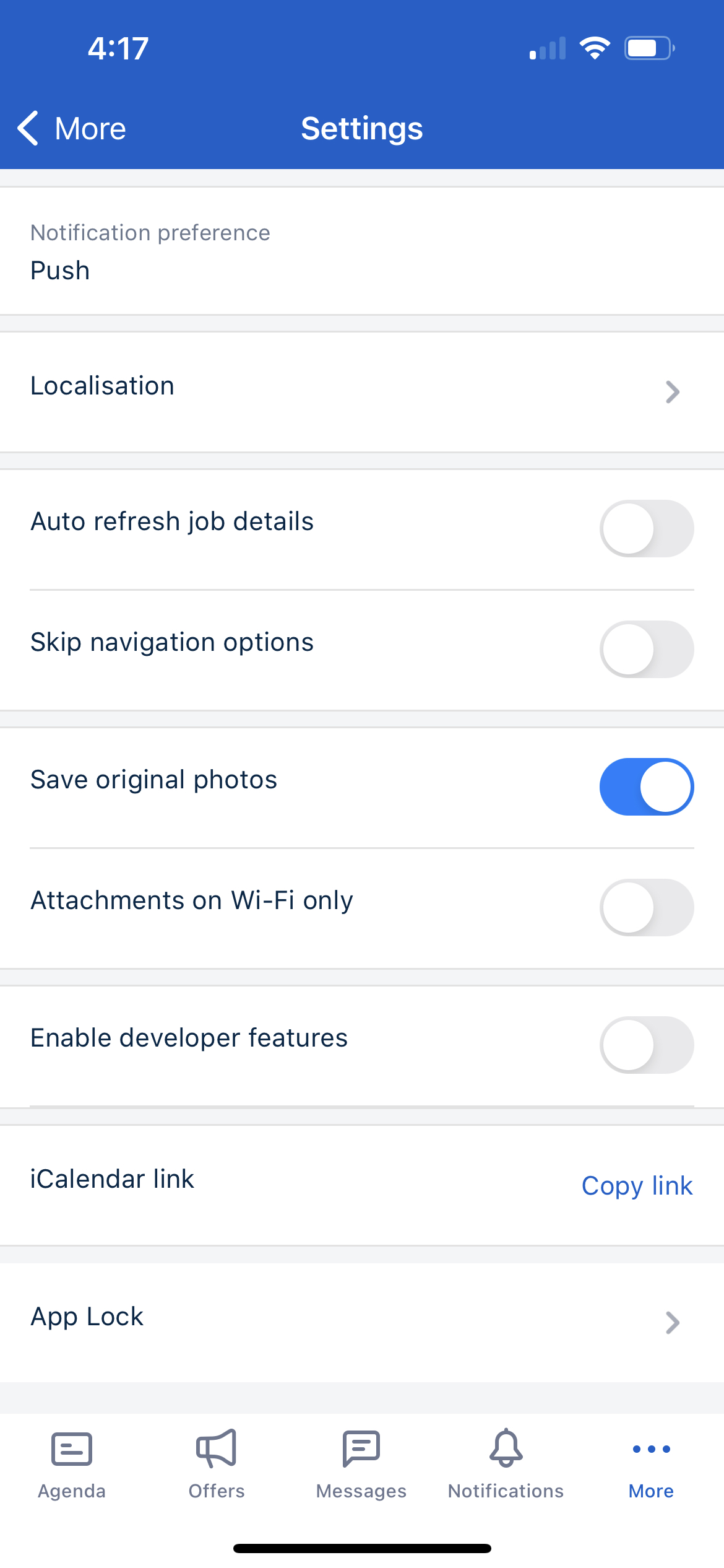 The Skedulo v2 mobile app settings screen with listed options.